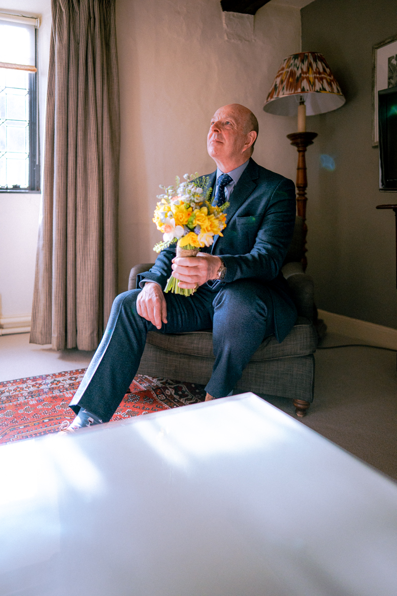 Father of the bride, listening to a letter read from the bride