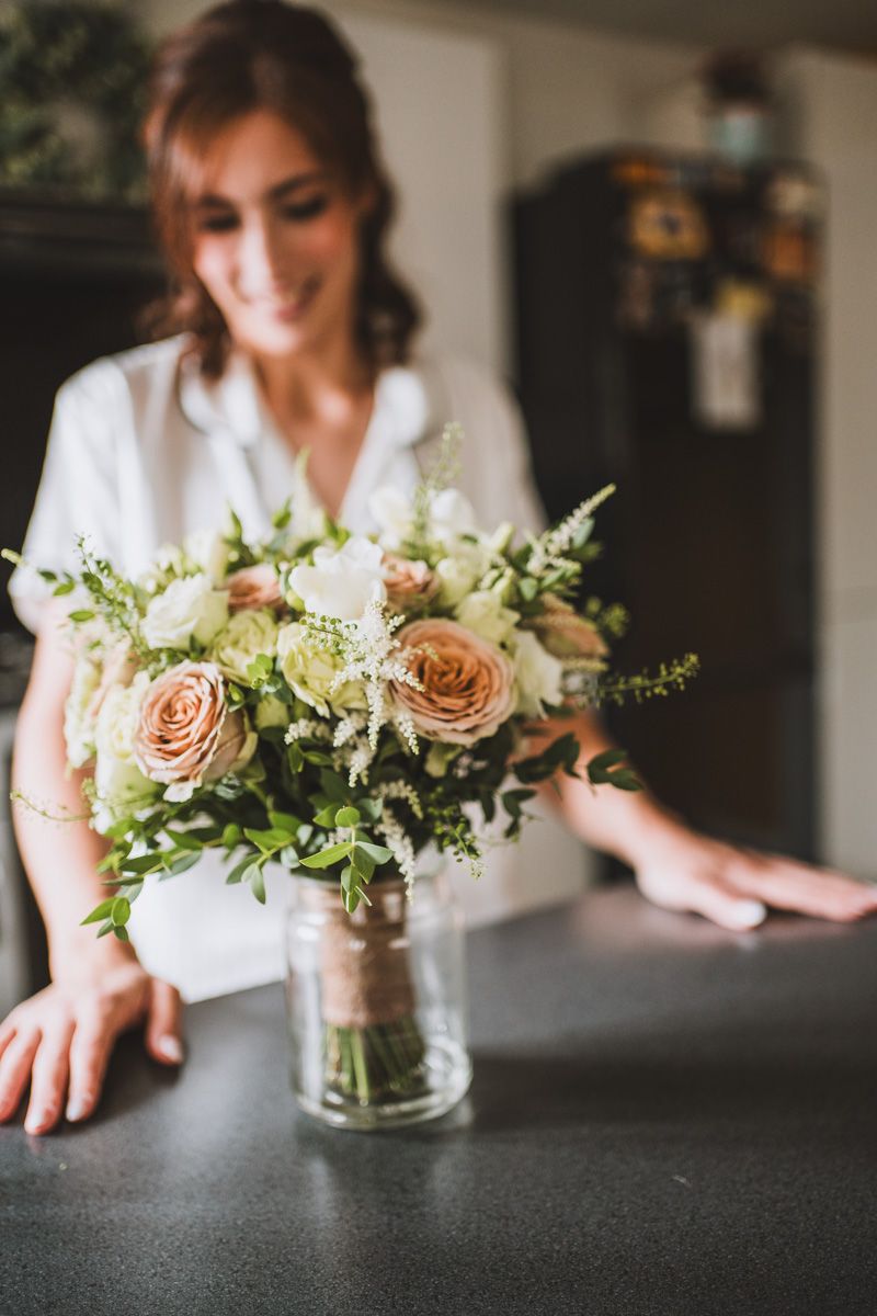 Bride seeing her wedding bouquet for the first time