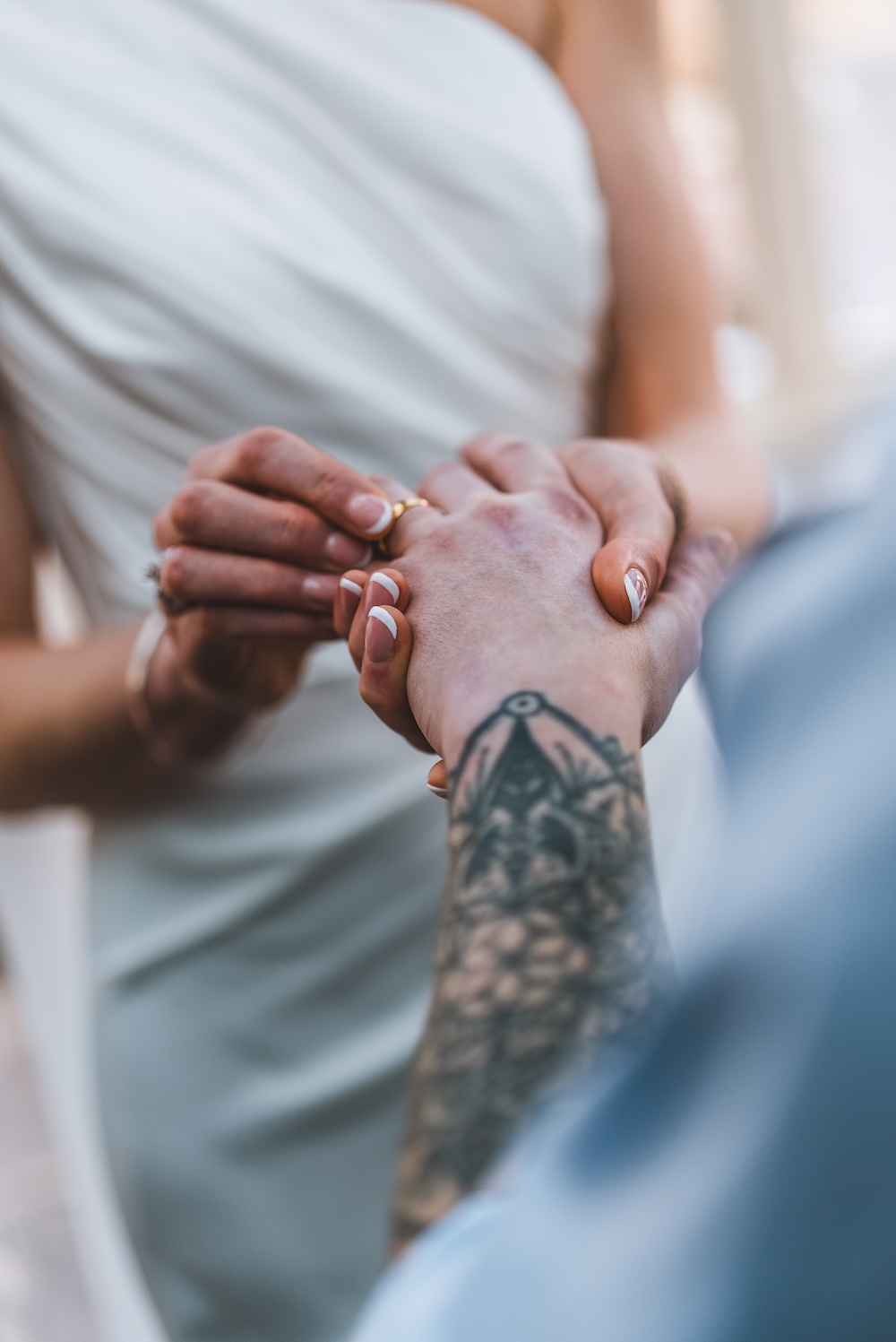 Couple exchanging rings during a Bristol wedding ceremony