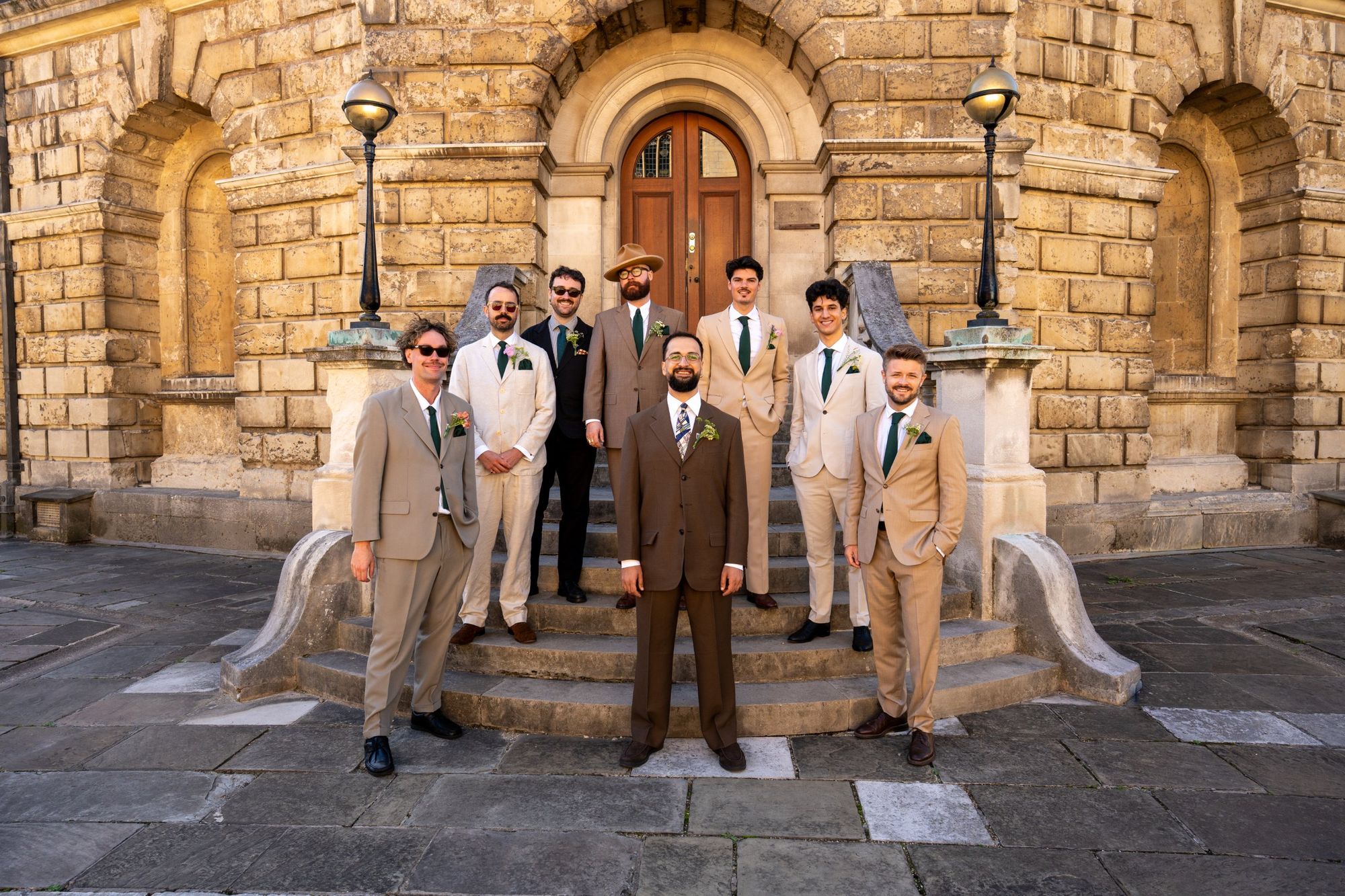 Groom and groomsmen on the steps of the Radcliffe Camera, Oxford
