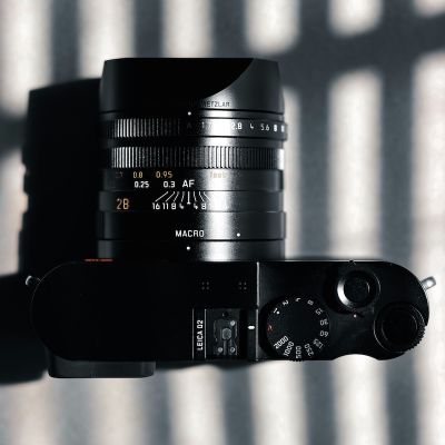 Close-up of a Leica Q2 camera used for documentary wedding photography.