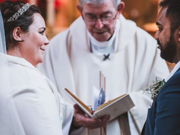 Bride and Groom in the Catholic wedding cememony in the Cotswolds